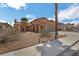 Inviting exterior of a well-maintained, single-Gathering home with manicured landscaping and a spacious driveway at 2111 River City Dr, Laughlin, NV 89029