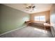 Bedroom featuring carpet floors and unique built-in desks providing ample study and work space at 220 Hollyfern St, Henderson, NV 89074