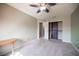 Bedroom features carpet, ceiling fan, closet organizer and an open doorway to another room at 220 Hollyfern St, Henderson, NV 89074