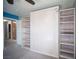 This bedroom features built-in shelves and a murphy bed at 220 Hollyfern St, Henderson, NV 89074