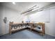 This garage features a work bench and peg board at 220 Hollyfern St, Henderson, NV 89074
