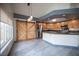 Bright kitchen boasts stainless steel appliances, granite countertops, and a modern barn door at 220 Hollyfern St, Henderson, NV 89074
