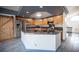 Updated kitchen featuring stainless steel appliances, granite countertops, island, and modern finishes at 220 Hollyfern St, Henderson, NV 89074
