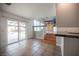 Open living space with a view of the pool, access to the kitchen, and a sliding glass door at 220 Hollyfern St, Henderson, NV 89074