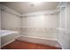Walk-in closet with custom shelving for optimal storage and organization at 220 Hollyfern St, Henderson, NV 89074