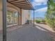 Backyard area featuring low-maintenance landscaping, a pergola, and a view of the mountains at 24 Via Vasari # 104, Henderson, NV 89011