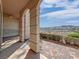 Covered patio with view overlooking the surrounding landscape at 24 Via Vasari # 104, Henderson, NV 89011