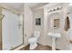 Bathroom with shower stall, toilet, and vanity with sink and tiled floors at 2424 Chestnut Hill St, Las Vegas, NV 89134