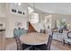 Open floorplan with dining area, high ceilings, chandelier, staircase, and view of living room at 2424 Chestnut Hill St, Las Vegas, NV 89134
