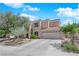 Two-story home with a three car garage and easy care landscaping at 2424 Chestnut Hill St, Las Vegas, NV 89134