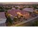 Aerial view showcasing a single-Gathering home with a tile roof and landscaped surroundings at 2548 Faiss Dr, Las Vegas, NV 89134
