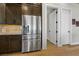 Modern kitchen with stainless steel refrigerator and complementary cabinetry at 2548 Faiss Dr, Las Vegas, NV 89134