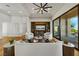Open-concept living room boasts modern built-ins, plush seating, and seamless indoor-outdoor flow at 2548 Faiss Dr, Las Vegas, NV 89134