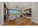 Spacious living room with modern furnishings and an open view of the kitchen and outdoors at 2548 Faiss Dr, Las Vegas, NV 89134