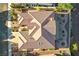 Aerial roof shot showing tile work, vents, and a manicured yard with desert landscaping at 2548 Faiss Dr, Las Vegas, NV 89134
