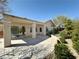 Spacious backyard featuring a covered patio and well-maintained landscaping at 2558 Grandville Ave, Henderson, NV 89052