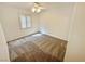 This bedroom features neutral carpet and a shuttered window at 2558 Grandville Ave, Henderson, NV 89052