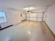 Clean and organized garage features ample storage cabinets, bright lighting, and a well-maintained floor at 2558 Grandville Ave, Henderson, NV 89052