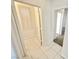 Hallway boasts tile flooring and white doors with contemporary hardware, enhancing the modern appeal at 2558 Grandville Ave, Henderson, NV 89052