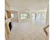 Bright living room with tile flooring, fireplace, and multiple windows providing ample natural light at 2558 Grandville Ave, Henderson, NV 89052