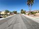 Wide, quiet street view showcasing the neighborhood and well-maintained landscaping at 2558 Grandville Ave, Henderson, NV 89052