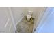 Functional toilet room with tile flooring and white fixtures at 2558 Grandville Ave, Henderson, NV 89052