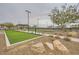 Bocce ball court featuring well-maintained surfaces, rocks, mountain views, and ample lighting at 26 Sun Mirage Ave, Henderson, NV 89011