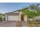 Charming single-story home featuring a two-car garage and desert landscaping at 26 Sun Mirage Ave, Henderson, NV 89011