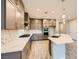 Modern kitchen featuring sleek countertops, stainless steel appliances, and a kitchen island at 26 Sun Mirage Ave, Henderson, NV 89011