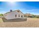 A backyard features fresh rock and concrete patio space at 2629 Blue Reef Dr, North Las Vegas, NV 89032