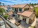 Aerial view showcasing the backyard, outdoor patios and waterfront access at 2708 Port Of Call Dr, Las Vegas, NV 89128