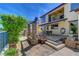 Beautiful back patio with a dining table, potted plants and view of the water at 2708 Port Of Call Dr, Las Vegas, NV 89128