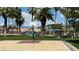 Outdoor basketball court in a community park on the lagoon with mature palm trees at 2708 Port Of Call Dr, Las Vegas, NV 89128