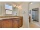 Bathroom features granite countertops, wooden cabinets, and access to the walk-in shower at 2708 Port Of Call Dr, Las Vegas, NV 89128
