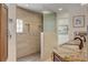Luxurious bathroom featuring double sinks with granite countertops and a spacious glass-enclosed shower at 2708 Port Of Call Dr, Las Vegas, NV 89128