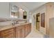 Spacious bathroom with double vanity, granite countertop, and large mirror at 2708 Port Of Call Dr, Las Vegas, NV 89128