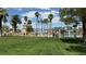 Expansive green community park on the lagoon with shade structures, mature trees, and landscaping at 2708 Port Of Call Dr, Las Vegas, NV 89128