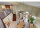 Elegant dining room with soaring ceilings, staircase, open floor plan, and neutral tile floors at 2708 Port Of Call Dr, Las Vegas, NV 89128