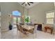 Charming dining area with tile floors, large windows, and elegant decor at 2708 Port Of Call Dr, Las Vegas, NV 89128