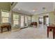 Spacious foyer with tile flooring, natural light, and a view to the outdoor patio at 2708 Port Of Call Dr, Las Vegas, NV 89128