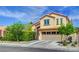 Charming two-story home with a well-manicured lawn and a spacious two-car garage at 2708 Port Of Call Dr, Las Vegas, NV 89128