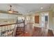 Well-lit loft with hardwood floors and decorative railing at 2708 Port Of Call Dr, Las Vegas, NV 89128