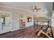 Loft area with hardwood floors, reading chairs, and access to the balcony at 2708 Port Of Call Dr, Las Vegas, NV 89128