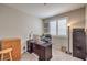 Home office with neutral walls, plush carpet and modern fixtures at 2711 Evolutionary Ln, Las Vegas, NV 89138