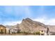 Stunning mountain view from backyard with beautiful neighborhood houses at 2711 Evolutionary Ln, Las Vegas, NV 89138