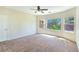 Spacious primary bedroom featuring three large windows offering ample natural light at 2713 Rue Toulouse Ave, Henderson, NV 89044