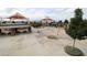 Community area with seating, playground and splashpad at 2713 Rue Toulouse Ave, Henderson, NV 89044