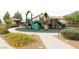 Community playground features multiple slides and play areas at 2713 Rue Toulouse Ave, Henderson, NV 89044