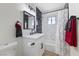 Modern bathroom featuring a shower/tub combination, modern fixtures, and vanity at 2724 Spear St, North Las Vegas, NV 89030