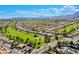 Aerial shot of homes along the golf course, showcasing a serene neighborhood with mountain views in the background at 2740 Billy Casper Dr, Las Vegas, NV 89134